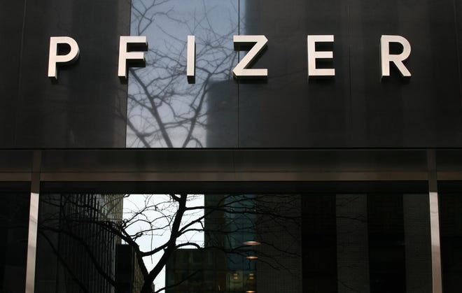 A sign at Pfizer world headquarters is shown in Jan. 2009 in New York. Pfizer announced that portions of its COVID-19 vaccine will be manufactured in West Michigan. (AP Photo/Mark Lennihan)