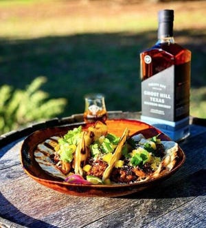 Make serrano-infused pineapple a few days ahead of time for these Smoked Pulled Pork Tacos from Treaty Oak in Austin, Texas. [Contributed by Treaty Oak]