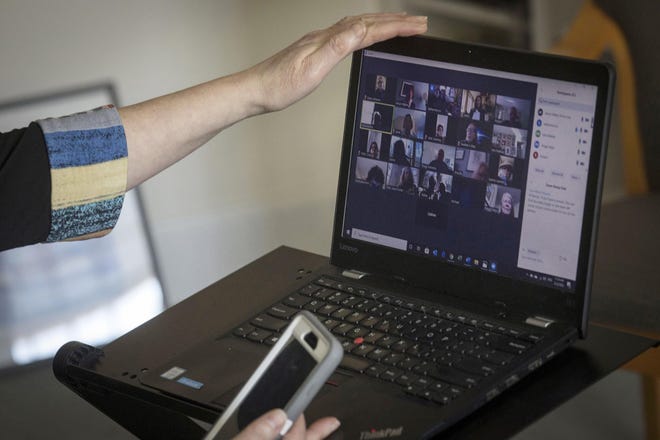 Videoconference applications such as Zoom make working from home easier but can be frustrating. [Dave Sanders/The New York Times]