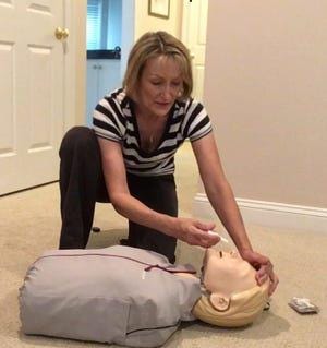 Dr. Bonnie Milas demonstrating how to administer Narcan in a training video for the University of Pennsylvania on Sept. 14, 2019. [CONTRIBUTED]