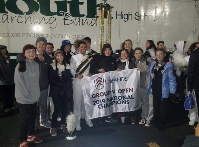 Members of the 2019 Dartmouth High School Marching Band pose for a photo. [COURTESY PHOTO]
