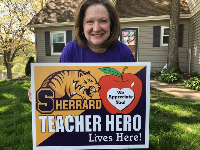 Kathy Felt, 8th grade math teacher at Sherrard junior high saw her idea take shape when teachers and staff were surprised by appreciation lawn signs last weekend.