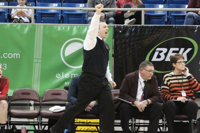 In this March 12, 2020 Journal file photo, Devils Lake head girls basketball coach Justin Klein calls out a play during the quarterfinals of the NDHSAA Class A girls state tournament against Century in Fargo. Klein was named Class A girls Coach of the Year.