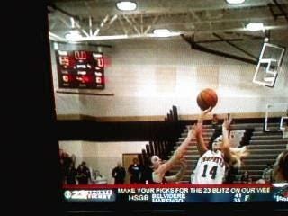 Emily McClain hits the winning shot at the buzzer — even though the clock shows no time left — in Prophetstown’s 71-70 victory over Dakota in the 2008 Class 1A girls basketball sectionals. [PHOTO PROVIDED]