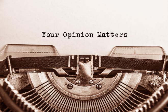 Text Your Opinion Matters typed on vintage typewriter retro. Close up
