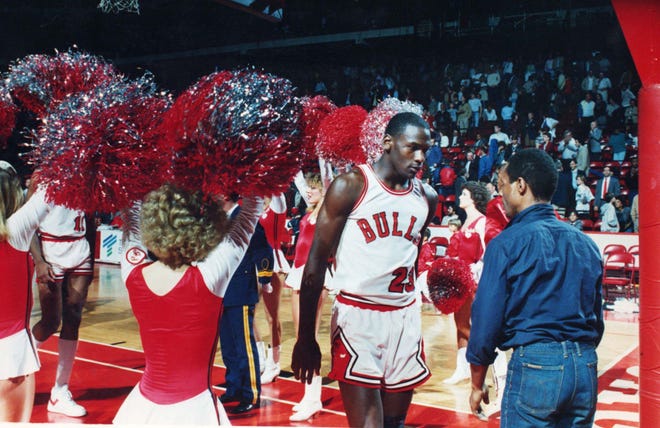 The Chicago Bulls' Michael Jordan trudges off the court after a playoff loss to Milwaukee in 1985. [Ed Wagner Jr./Chicago Tribune/TNS]