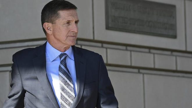 Former Trump national security adviser Michael Flynn leaves federal court in Washington, Friday, Dec. 1, 2017. Flynn pleaded guilty Friday to making false statements to the FBI, the first Trump White House official to make a guilty plea so far in a wide-ranging investigation led by special counsel Robert Mueller. [AP FILE]