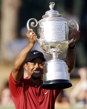 Tiger Woods holds up the Wannamaker Trophy after winning the 2007 PGA Championship at Southern Hills Country Club in Tulsa. The course learned Tuesday it will host the PGA Championship again in 2030. [OKLAHOMAN ARCHIVE]