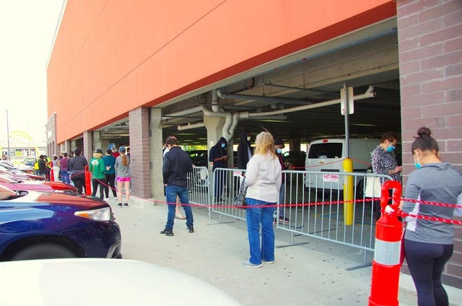 Customers wait to get into the Walmart on Route 1 North. Courtesy photo / Charlie Zapolski
