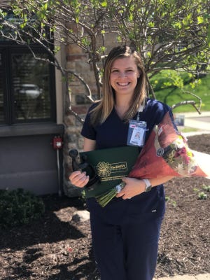 Callie Plager, a nurse at Monroe Clinic’s Highland Women’s Care in Freeport, received the Daisy award Tuesday for demonstrating extraordinary care and compassion. [PHOTO PROVIDED]