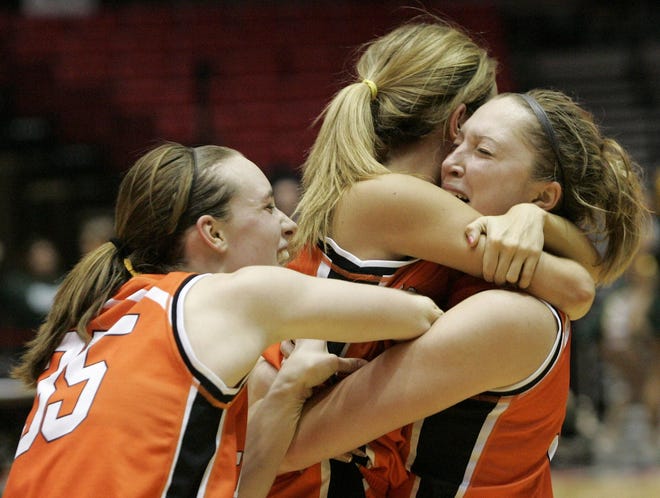 Courtney Shiffer, left, and Kelsey Hoefer, right, celebrate Freeport’s 2008 supersectional victory over Peoria Richwoods. [EDDY MONTVILLE/ROCKFORD REGISTER STAR FILE]