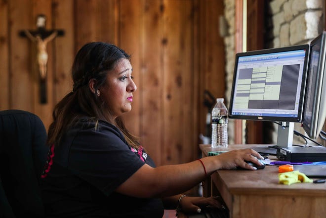Dania Cabrera, working from her Austin home amid the coronavirus pandemic, was 5 when her mother’s friends sneaked her across the Mexican border. [LOLA GOMEZ/AMERICAN-STATESMAN]