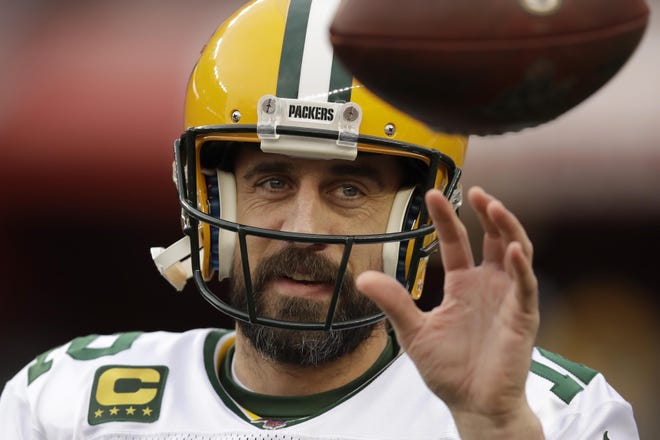 In this Jan. 19, 2020, file photo, Green Bay Packers quarterback Aaron Rodgers warms up before the NFL NFC Championship football game against the San Francisco 49ers in Santa Clara, Calif. [AP Photo/Ben Margot, File]