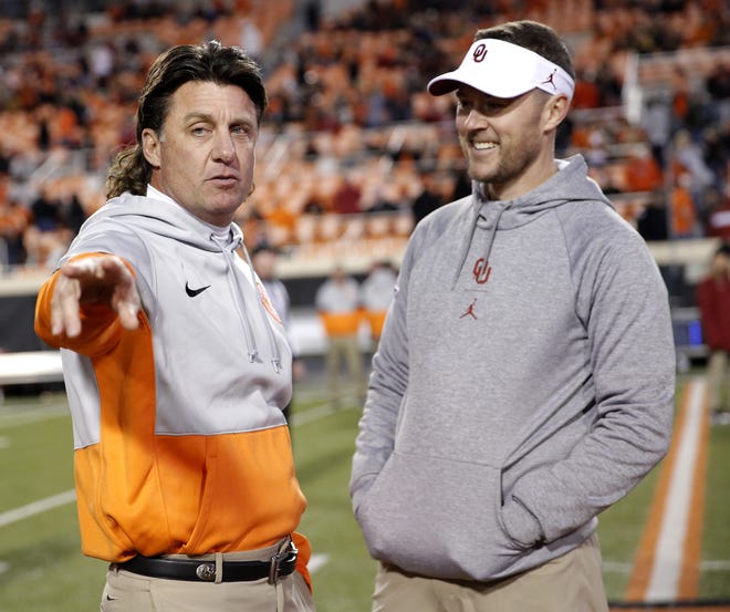 Oklahoma State football coach Mike Gundy, left, and Oklahoma coach Lincoln Riley have had to adjust to new recruiting methods due to the coronavirus pandemic. They have to find any way they can to connect with a recruit who most likely was planning an on-campus visit sometime in the last two months. [OKLAHOMAN ARCHIVES]