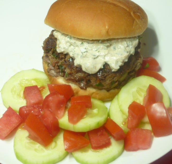 Moroccan Beef Burgers go great with Cucumber Tomato Salad. [Linda Gassenheimer/TNS]