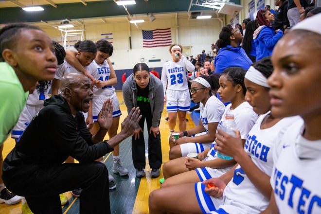Westampton Tech coach Darrell White speaks with his team during a March 10 playoff game. [DAVE HERNANDEZ / PHOTOJOURNALIST]