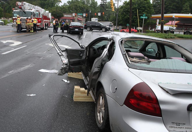 The driver of an automobile was transported to CaroMont Regional Medical Center following a crash involving a Gastonia firetruck Thursday morning on Cox Road near Franklin Boulevard. [JOHN CLARK/THE GASTON GAZETTE]