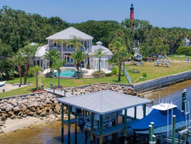 With the Ponce Inlet Lighthouse as a backdrop and Disappearing Island across the channel, this boater’s paradise includes an extreme deep-water dock, with a boat house, two lifts and sundeck.[Realty Pros Assured]