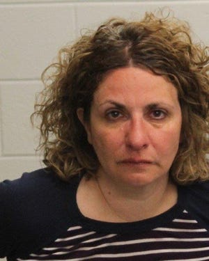Rose Schwartz, 44, of Lakeville was charged with Operating Under the Influence of Alcohol and other charges after being arrested by Raynham Police on Tuesday, May 19. [Raynham Police Department/Booking Photo]