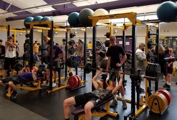 Members of the Jackson football team work out in the weight room during the 2019 offseason. (IndeOnline.com / Chris Easterling)