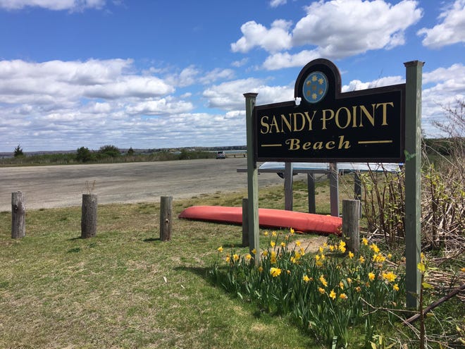 Sandy Point Beach will reopen with a series of regulations established by the town. DAILY NEWS FILE PHOTO]