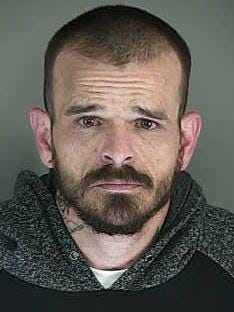 Joseph Lee Otis, 36, faces felony charges of robbery, theft and fleeing police. [Courtesy: Lane County Jail]