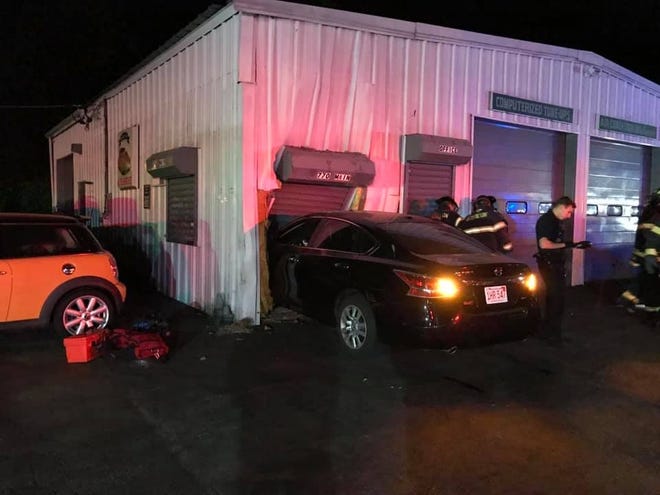 A 49-year-old Brockton man, whose name was not released by police, was cited after crashing his vehicle into Laham's Auto Service repair shop at 770 Main St. and assaulting a police officer on Friday, May 22, 2020, according to Brockton police. (Brockton Fire Department)