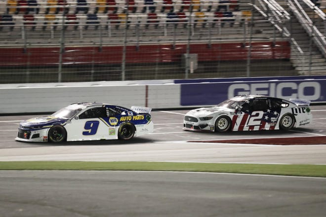 Chase Elliott (9) leads Brad Keselowski (2) during a NASCAR Cup Series race at Charlotte Motor Speedway on Sunday. Elliott finished second. [AP PHOTO/GERRY BROOME]