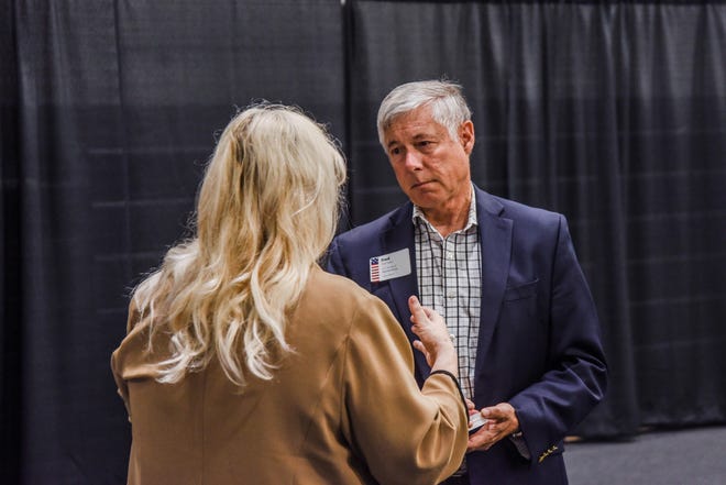 Rep. Fred Upton, R-Michigan, speaks with a member during the Michigan West Coast Chamber of Commerce's annual member breakfast in June 2019. On Tuesday, May 26, Upton introduced a bill that aims at assessing various data localization laws. (Sentinel File)
