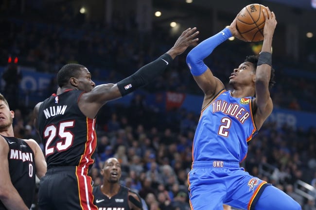 Shai Gilgeous-Alexander (2) and the Thunder could face Kendrick Nunn (25) and the Heat in the first round of the playoffs if the NBA ditches its standard format, as reported. [Bryan Terry/The Oklahoman]
