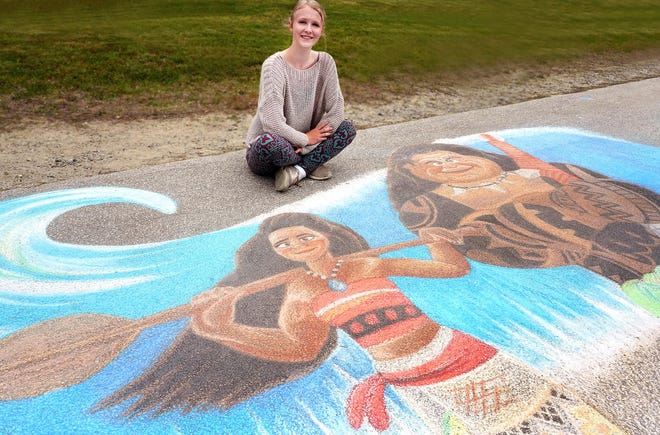 Haley Sanborn of Seabrook combines her artistic talents with her love of animated movies and their characters outside of her house. [Rich Beauchesne/Seacoastonline]