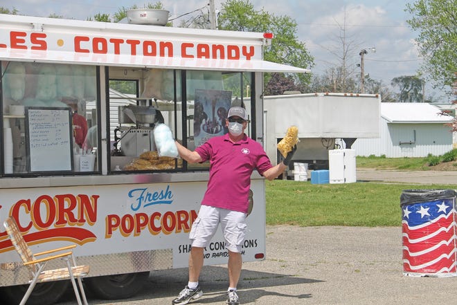 Cotton candy and caramel corn were some of the more popular items at the fairgrounds this past weekend.



{Troy Tennyson Photo}