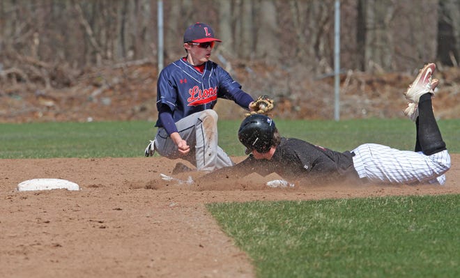 Lincoln second baseman Randall Hien puts the tag on East Greenwich's Corey Gavin during a game in April 2018. [The Providence Journal, file / Steve Szydlowski]