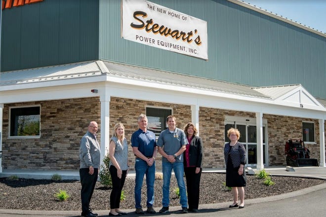 Abington Bank’s President and CEO Andy Raczka, pictured left, and Assistant Vice President and portfolio manager Joyce Holbrook, far right, join Kait Stewart Joyce, Don Stewart, Matt Stewart and Shelley Stewart at the new location of Stewart’s Power Equipment. [Courtesy Photo]
