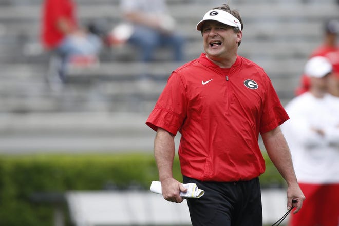 Georgia coach Kirby Smart yells out during warmup before an football scrimmage in Athens, Ga., Saturday, April 13, 2019. [Photo/Joshua L. Jones, Athens Banner-Herald]