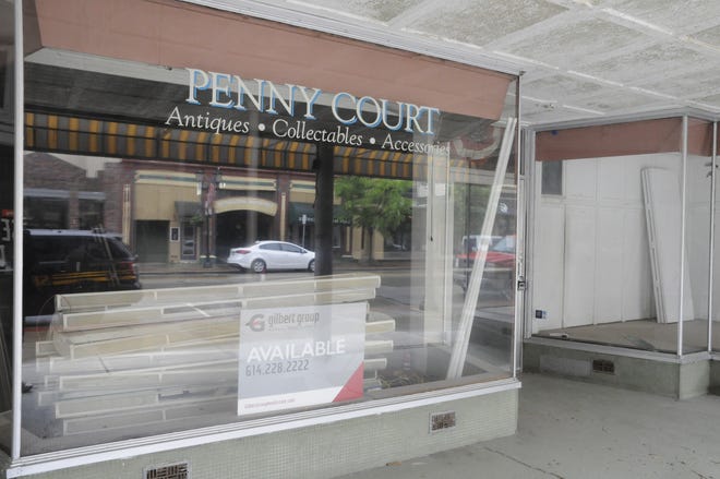 Penny Court, a long-time attraction in Downtown Cambridge, is undergoing repairs after a fire in January damaged the building.