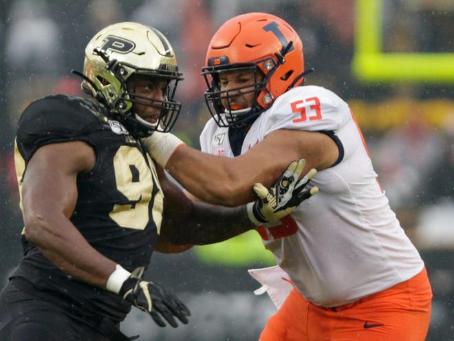 Purdue defensive end Kai Higgins (98) is blocked by Illinois offensive lineman Kendrick Green (53) during the first quarter of a game on Saturday, Oct. 26, 2019 at Ross-Ade Stadium in West Lafayette, Ind. [NIKOS FRAZIER/Journal & Courier]
