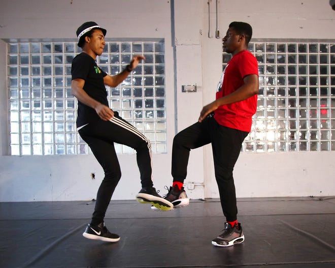 Chris Shepard, left, and Temofe "T" Ogbe, dancers with RACE Dance Collective, rehearse for the Plaza District's "Solidarity in the Plaza: Black Lives Matter" event on Juneteenth, Tuesday, June 16, 2020. [Doug Hoke/The Oklahoman]