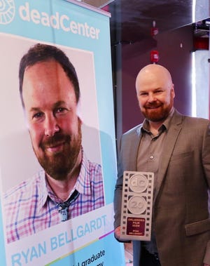 Ryan Bellgardt, filmmaker and the founding partner and creative director of Boiling Point Media, receives the deadCenter Film Festival 2020 Oklahoma Film & TV ICON Award at the Tower Theater Saturday, June 13, 2020. [Doug Hoke/The Oklahoman]