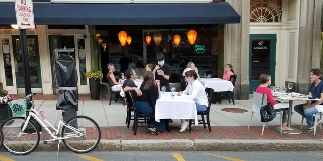 Patou in Belmont Center takes advantage of the town's outdoor dining plan, offering seating for customers on the sidewalk and in the parking lane in front if its Leonard Street address. [Courtesy photo]

Patou in Belmont Center takes advantage of the town's outdoor dining plan, offering seating for customers on the sidewalk and in the parking lane in front if its Leonard Street address. [Courtesy photo]