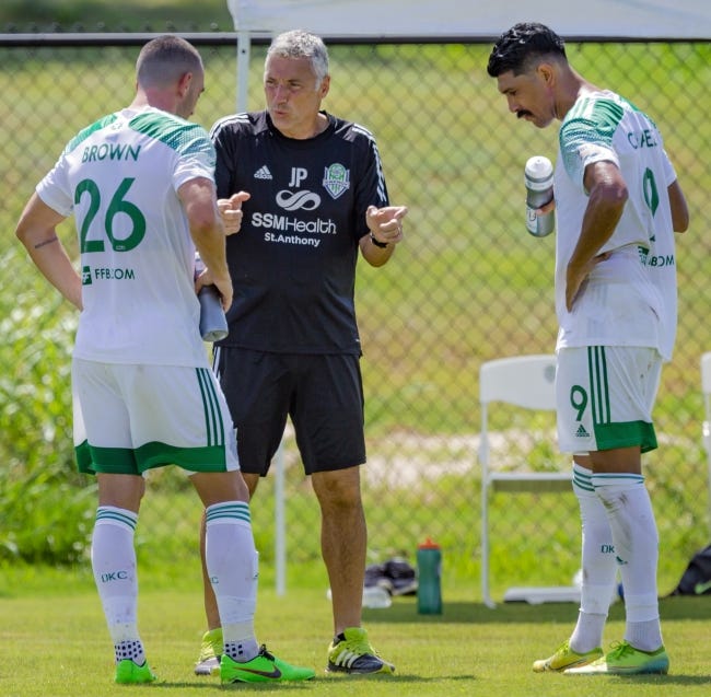 Energy FC head coach John Pascarella taks to players Jon Brown (26) and Jamie Chavez (9) during a scrimmage against Sporting KC II on July 3 in Oklahoma City. [Chris Landsberger/The Oklahoman]