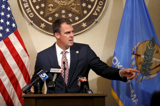 Gov. Kevin Stitt gives an update to Covid-19 at the Oklahoma state Capitol in Oklahoma City, Thursday, July 9, 2020. Photo by Sarah Phipps, The Oklahoman