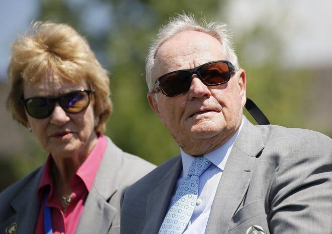 Jack Nicklaus, seen with his wife, Barbara, said Sunday they both tested positive for COVID-19 in March. [ADAM CAIRNS/USA TODAY NETWORK]