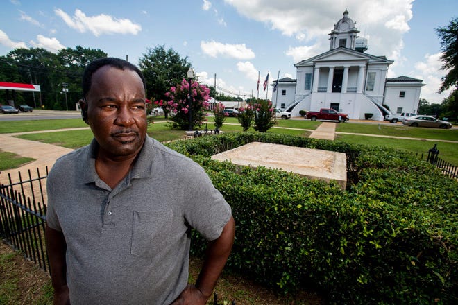 Lowndes County Commissioner Robert Harris stands near the spot where a Confederate monument once stood in front of the county courthouse in Hayneville, Ala., on July 17, 2020. [PHOTO BY MICKEY WELSH / ADVERTISER]