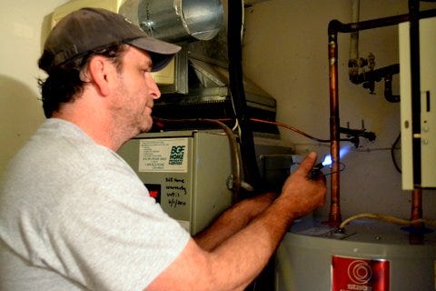 If your heater’s not leaking or rusting or exploding, a good tuneup or repair might allow you to delay purchasing a replacement for another few years, especially if yours is relatively new. [PlumbMaster/CC BY-SA (https://creativecommons.org/licenses/by-sa/4.0)]