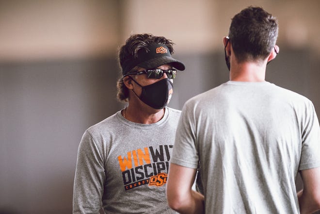 OSU coach Mike Gundy is excited about the energy and discipline of his team through preseason camp. [Bruce Waterfield/Courtesy of OSU Athletics]