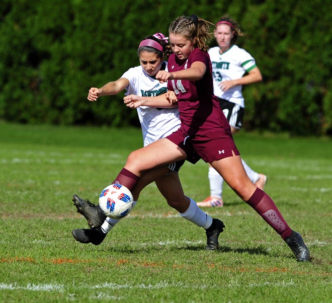 Bishop Stang's Lily Shields goes after the ball against Dartmouth last season. Both Stang and Dartmouth will field soccer teams this fall. [DAVID W.OLIVEIRA/STANDARD-TIMES SPECIAL/SCMG]