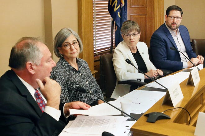Members of the State Finance Council include, from left, Senate Majority Leader Jim Denning, R-Overland Park; Senate President Susan Wagle, R-Wichita; Gov. Laura Kelly; and House Speaker Ron Ryckman, R-Olathe. [June 2019 file photo/The Capital-Journal]