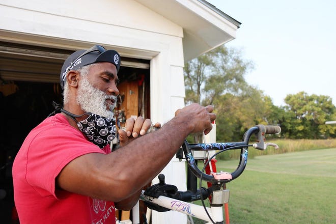 When a neighbor needs someone to fix a bike, Everett Bradley can’t say no. He once worked for a bicycle repair shop in downtown, before his own garage filled with bicycles and repair projects. [MICHELE CLARK/Newton Kansan]