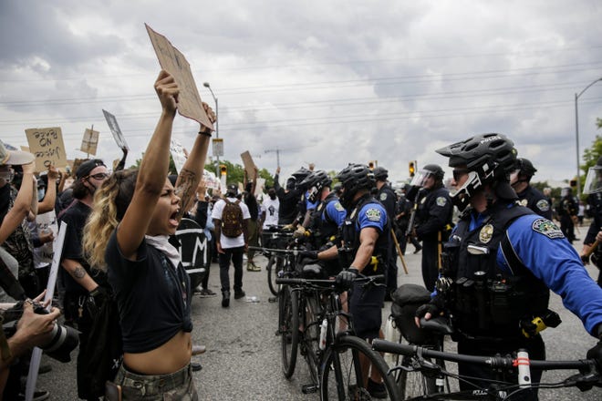 Thousands of people on May 31 participated in protests against police violence after the deaths of George Floyd in Minneapolis and Michael Ramos in Austin. Anthony Evans, who participated in the May protests, is suing the city of Austin after a police officer shot him with a bean bag round. [BRONTE WITTPENN/AMERICAN-STATESMAN]